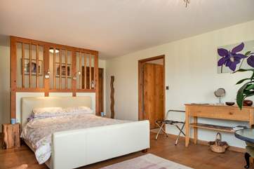 Bedroom 1 is a large spacious room with a king-size bed.