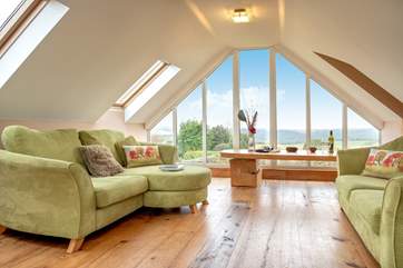 The sitting-room is on the first floor making the most of those wonderful views.