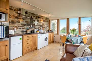 You can relax in the sofa whilst keeping the cook entertained.