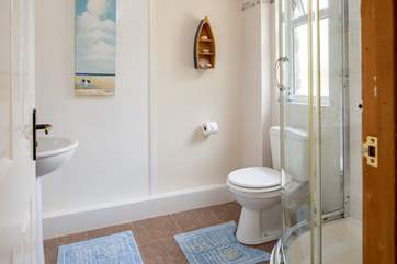 The family shower-room is light and spacious.