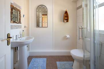 The family shower-room is light and spacious.
