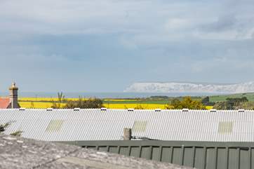 From the upstairs bedroom of aptly named Sunset Cottage, watch the sunset over The Needles.
