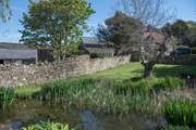 Sunset Cottage is in an idyllic setting surrounded by mature gardens - please take care with children near the pond.