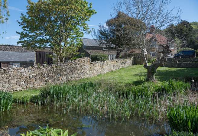 Sunset Cottage is in an idyllic setting surrounded by mature gardens - please take care with children near the pond.