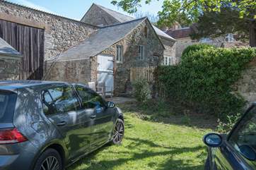 The owner has some free-range chickens which live in the neighbouring barn and may wander around the parking area.