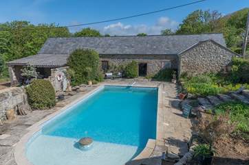 The half moon section with fountain is just 30cm deep, perfect for little ones. This then leads into the shallow end which is 1m deep, leading to the deepest area of 2.2m deep.