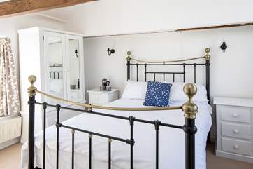 The master bedroom offers space and style.