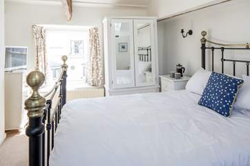 The master bedroom is so attractive from every angle.