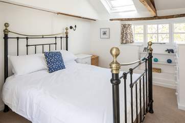 The master bedroom is a wonderful place to catch up on that well-deserved rest.