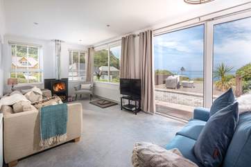 The sitting-room takes full advantage of the sea views.
