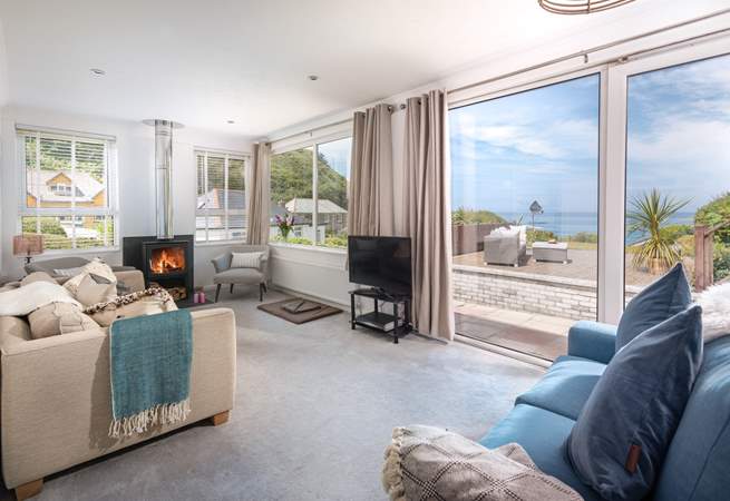 The sitting-room takes full advantage of the sea views.