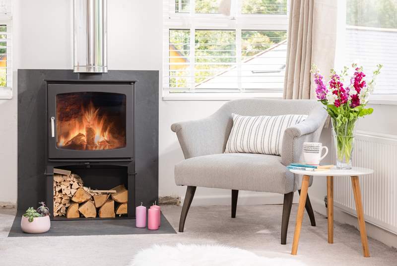 Snuggle up in front of the cosy wood-burner with a good book.