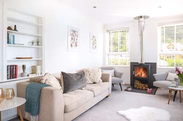 The sitting-room has comfy seating for the whole family.