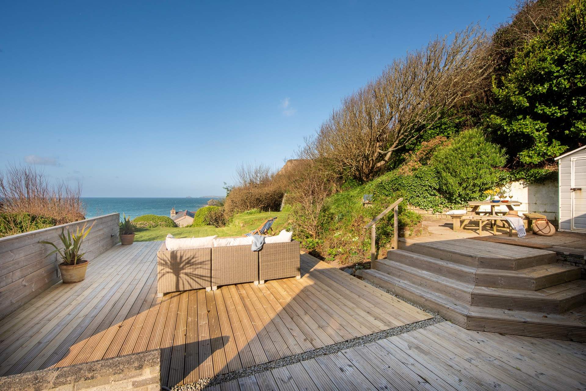 Steps lead up to the second decking area which catches the sun throughout the day. 
