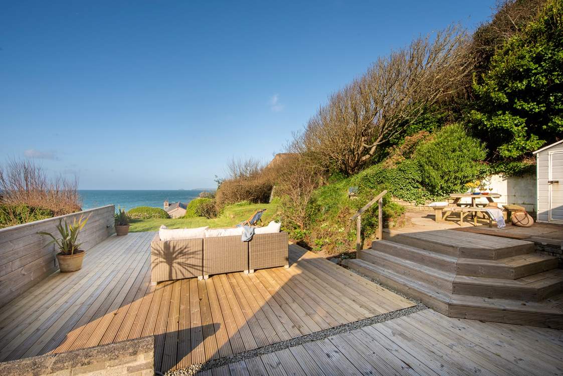 Steps lead up to the second decking area which catches the sun throughout the day.