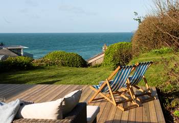 Kick back and relax on the sofa or deck chair. 