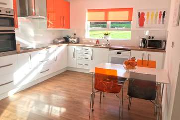 A wonderfully bright and well-equipped kitchen.