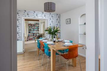 Looking into the dining area from the kitchen. If the weather doesn't allow dining al fresco, never fear, you have this wonderful dining-room at your disposal.