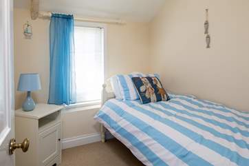 Bedroom three offers this rather charming single room.