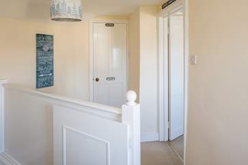 Access to the bathroom to the left and the master bedroom to the right.