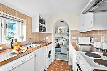 The well equipped kitchen is ready and waiting for your arrival.