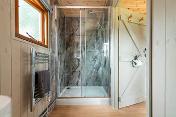 In true luxury glamping style, there is of course an en suite shower-room, and a gorgeous one at that!