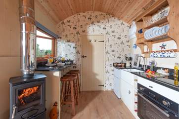 Beautiful wallpaper adorns the end wall.
