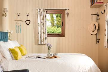 The sumptuous king size bed is perfect for a blissful sleep.