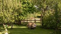 Slow afternoons are best spent in this sun-dappled spot.