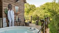 Tucked away in its own private orchard with a blissful hot tub.