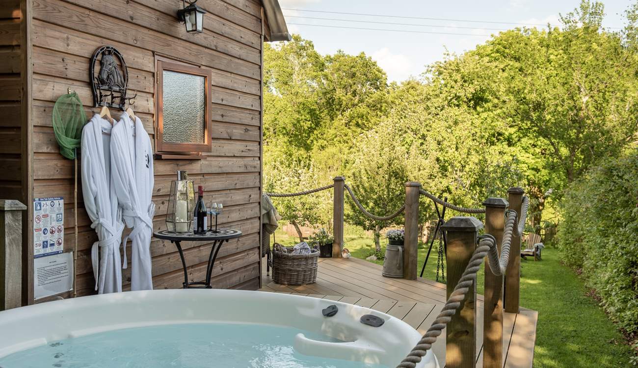 Tucked away in its own private orchard with a blissful hot tub.