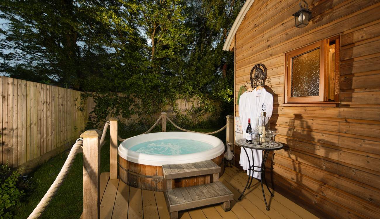 Sink into the hot tub and enjoy romantic moments under the stars.