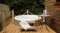 Soak away your worries in the bubbling hot tub.