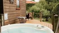 Tucked away in its own private orchard with a blissful hot tub.