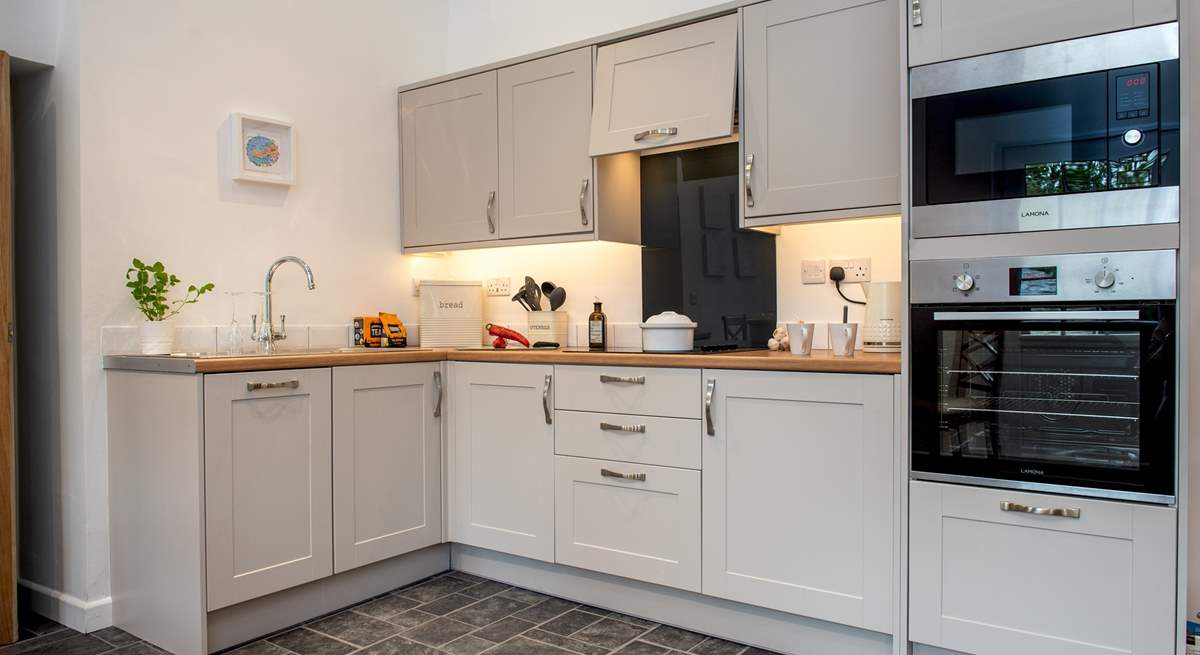 The stylish modern kitchen-area.