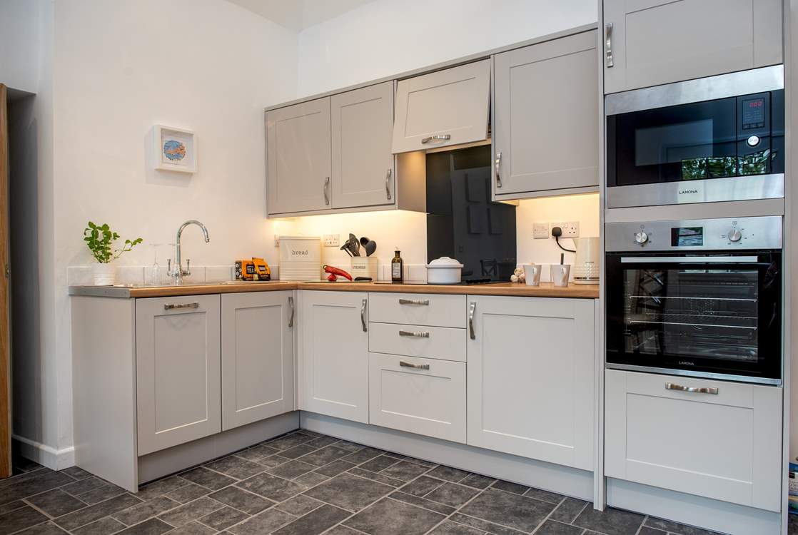 The stylish modern kitchen-area.