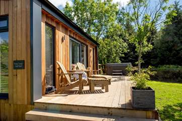 Enjoying the glorious views from the bubbling hot tub is a must.