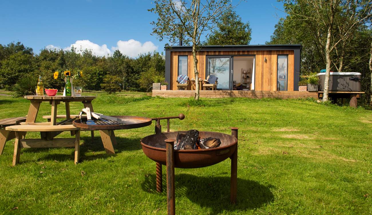 Light the rustic firepit and stay cosy until the moon and stars appear. 