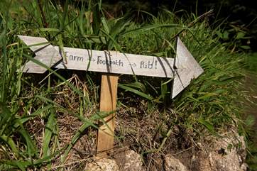 The sign says it all! Just a stroll to the village.