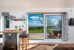 The patio doors enhance the fabulous views from indoors.