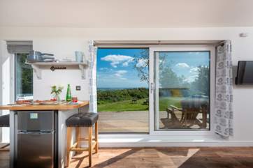 The patio doors enhance the fabulous views from indoors.