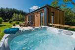Which can be enjoyed from the secluded hot tub.