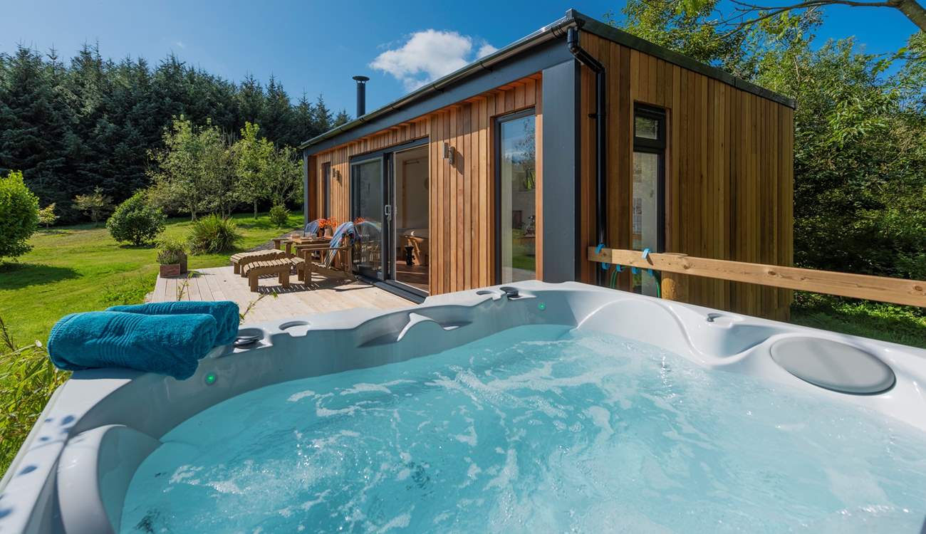 Which can be enjoyed from the secluded hot tub.