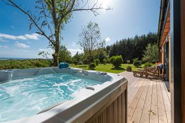 A sea view from the hot tub too.