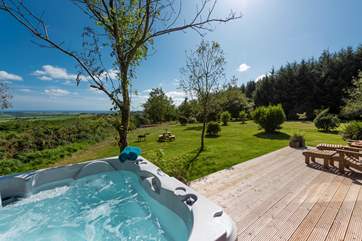 Enjoying the glorious views from the bubbling hot tub is a must.