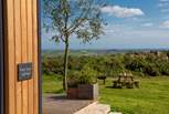 There are gorgeous far-reaching views over countryside to the sea in the distance.