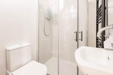 Head through to the sleek, stylish shower-room.