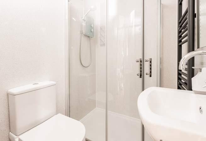 Head through to the sleek, stylish shower-room. 