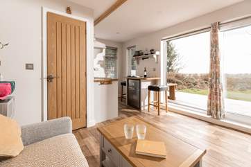 Open up the large door and allow fresh air to flow throughout the hideaway.