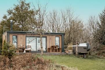 The lovely decking and blissful garden provide plenty of spots to soak up the Cornish sunshine.